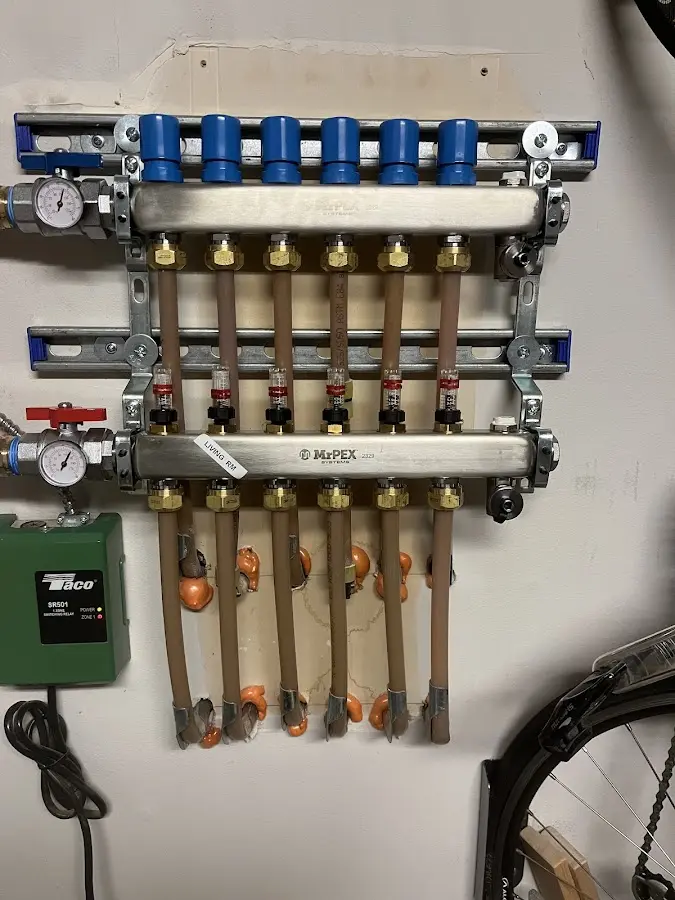 Plumber performing Water Heater Repair at a residential property in Hillsborough